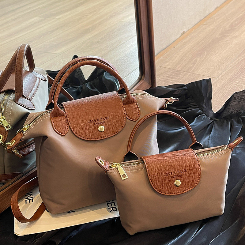 高级质感尼龙包包女包2025新款休闲斜挎小方包大容量百搭通勤包,淘宝优惠券,粉丝福利购,淘宝优惠卷