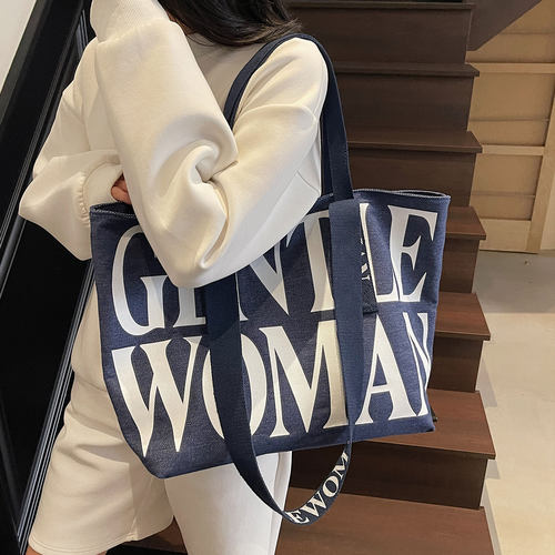 泰国小众字母帆布托特包女2026新款时尚手提大容量轻便单肩通勤包 - 图1