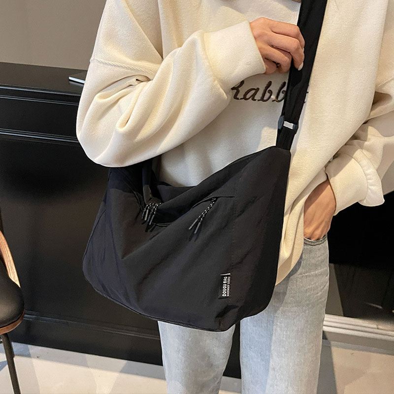 简约日系纯色尼龙帆布包包女2025新款休闲斜挎包大容量单肩通勤包,淘宝优惠券,粉丝福利购,淘宝优惠卷