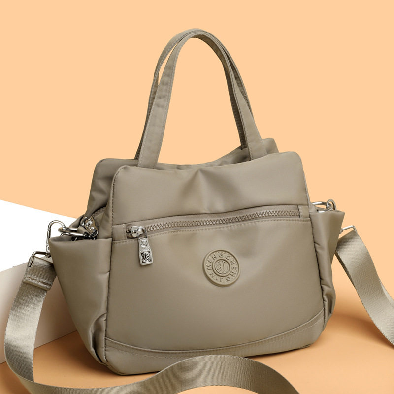 2026新款单肩斜挎包女大容量多口袋牛津帆布通勤上班杂物手提小包,淘宝优惠券,粉丝福利购,淘宝优惠卷