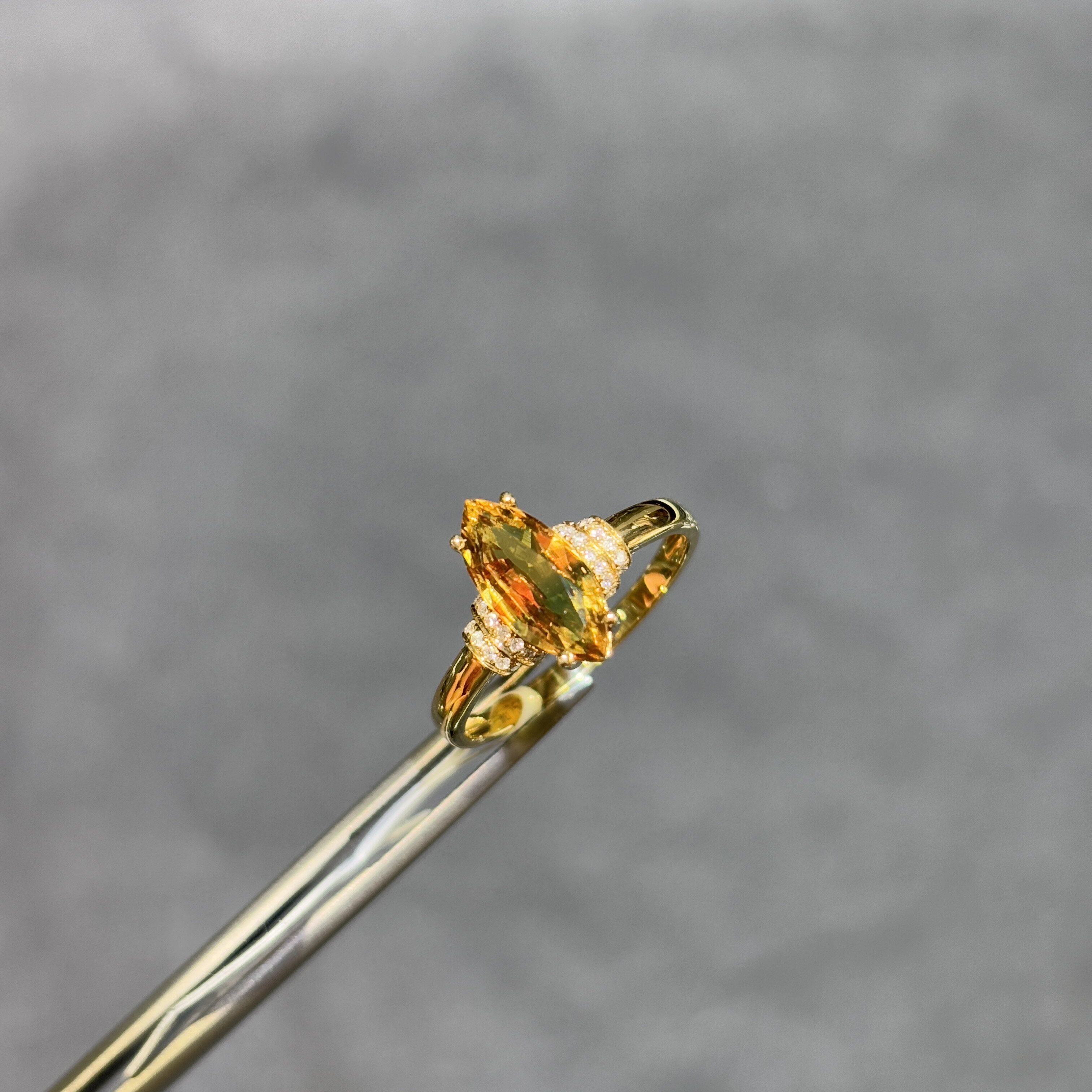 18K gold natural orange sapphire ring with diamonds