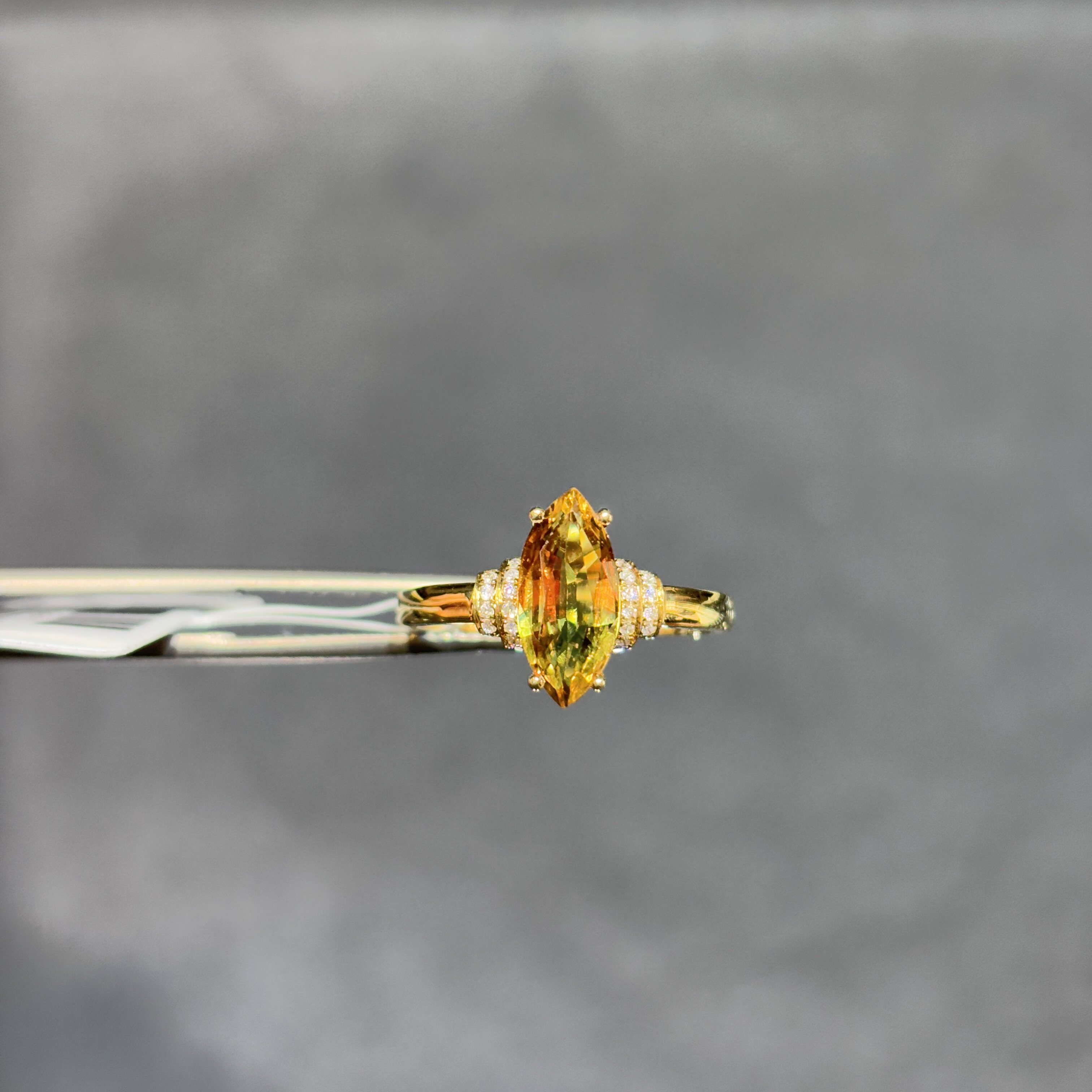 18K gold natural orange sapphire ring with diamonds