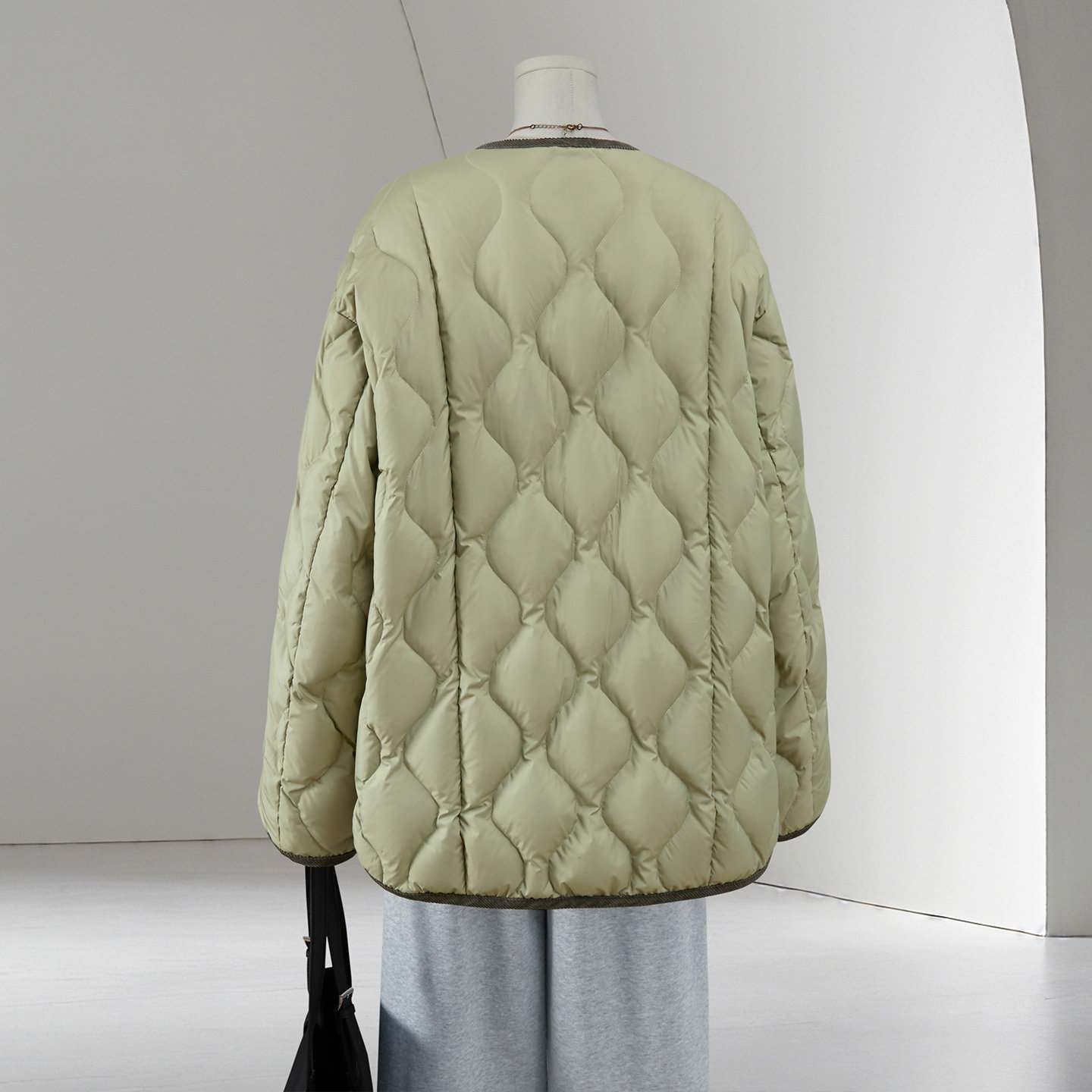 她池单排扣羽绒服2025冬季新款女装撞色拼接宽松款长袖保暖外套