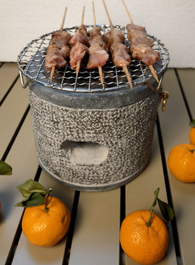 青石围炉煮茶圆柱形荔枝面