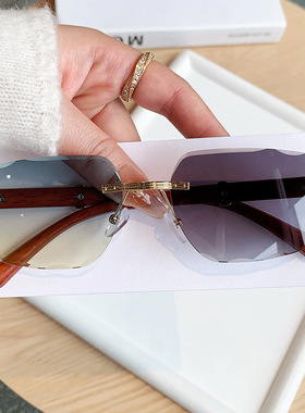 欧美时尚新款无框切边变色太阳镜时尚街拍高级感墨镜木纹腿潮眼镜