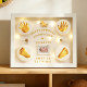 Baby's hand, foot and foot prints to commemorate the first birthday