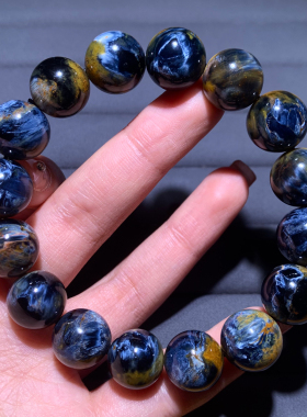 天然原矿彼得石单圈手串暴风虎女