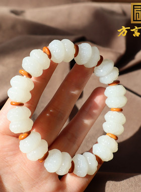 新疆且末料白玉巧雕双头莲花手串