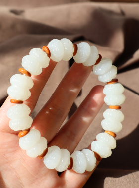 新疆且末料白玉巧雕双头莲花手串