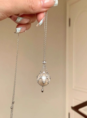 新款水晶捕梦网吊坠珍珠网兜项链高级感小众设计毛衣链锁骨链饰品