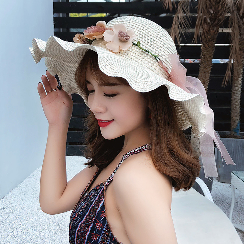 向朵旗舰店韩版大沿遮阳帽子网红女夏天沙滩花朵蝴蝶结波浪边草帽海边太阳帽2