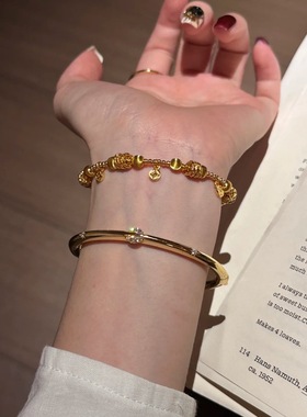 纯银s925镭射猫眼珠金币钱多多盘缠手链精致感气质百搭手饰轻奢