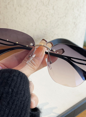 浅色无框防紫外线眩光女款墨镜