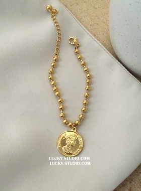 lucky轻奢小众金色硬币钛钢手链