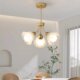 Nordic simple home guest restaurant glass chandelier three-head French pastoral romantic master bedroom study lily of the valley chandelier