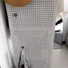 Frameless supermarket shelf side perforated panel display rack