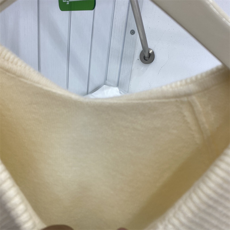 法式2025女冬新款时尚翻领长袖针织衫显瘦不规则羊毛毛衣上衣潮,淘宝优惠券,粉丝福利购,淘宝优惠卷