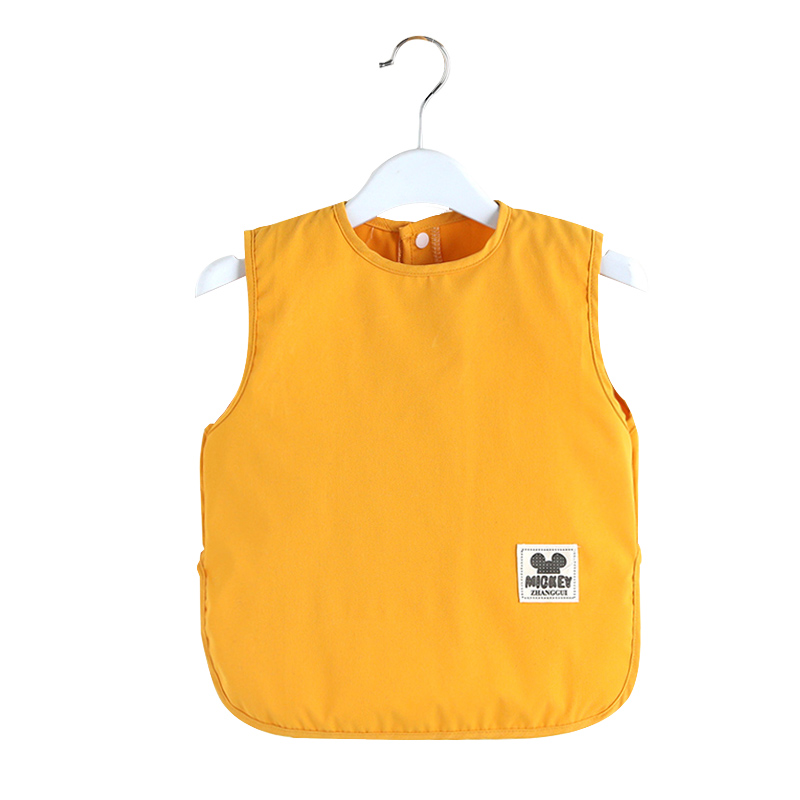 Anti-stain bib for baby wearing inside out while eating