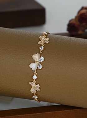 2026秋冬新款微镶锆石气质手饰品女感猫眼石蝴蝶结可调节抽拉手链