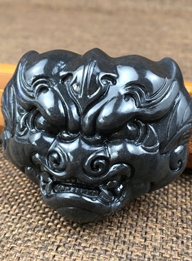 新疆和田玉籽料青花墨玉兽面手把件