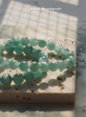 ins冷淡风猫眼拉丝绿海纹手串