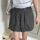 Spring and summer semi-elastic waist zipper plaid bud skirt