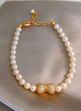 2026新款金色满钻蝴蝶结珍珠手链女复古轻奢小众手串高级感手饰品
