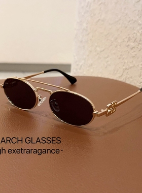 小红书潮高级感墨镜缪家走秀款金属框椭圆墨绿复古韩版太阳眼镜女