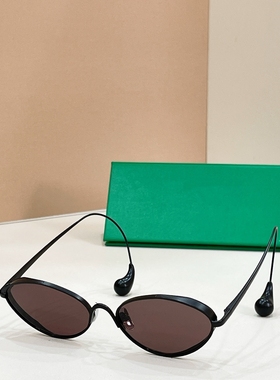 26时装秀港风猫眼复古椭圆太阳眼镜男女防紫外线遮阳墨镜挂耳钢珠