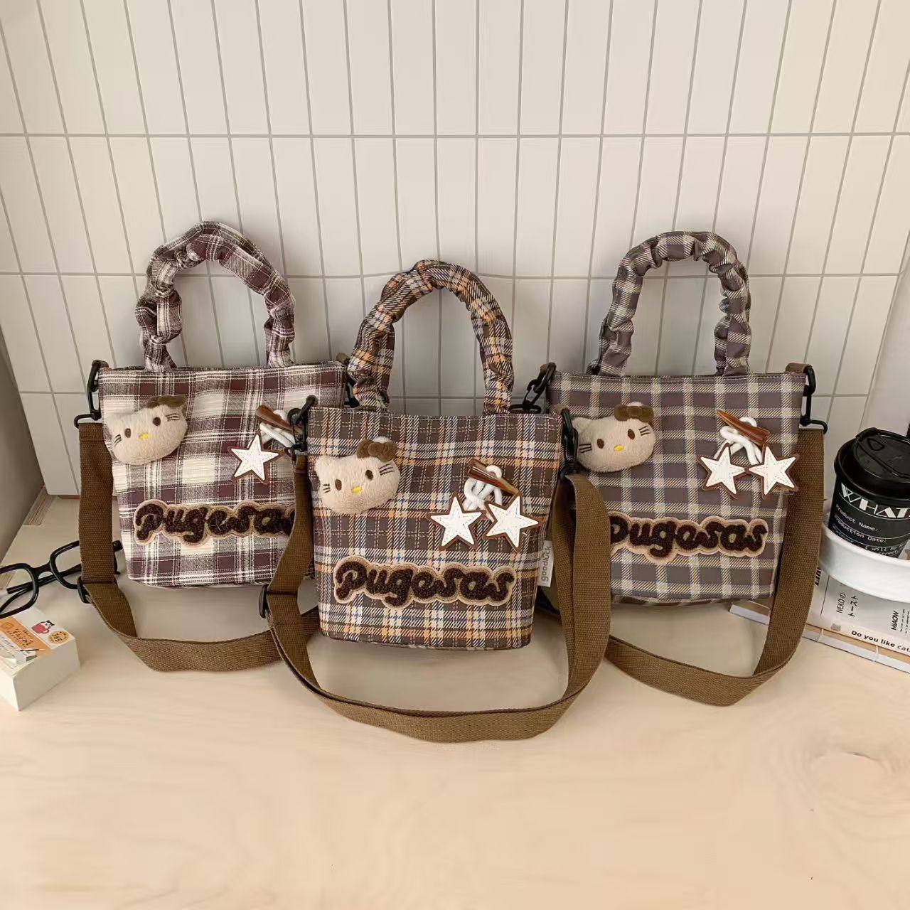 格纹包包女潮流时尚百搭单肩斜挎包高级感水桶包大容量学生研学包,淘宝优惠券,粉丝福利购,淘宝优惠卷