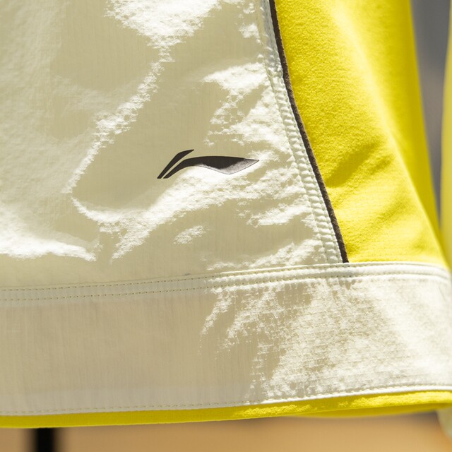 Li Ning windbreaker ແມ່ຍິງ 2026 ລະດູຮ້ອນແບບໃຫມ່ຂອງແມ່ຍິງກິລາແລ່ນແສງສະຫວ່າງປ້ອງກັນແສງແດດວ່າງເສື້ອກັນຫນາວສໍາລັບແມ່ຍິງ
