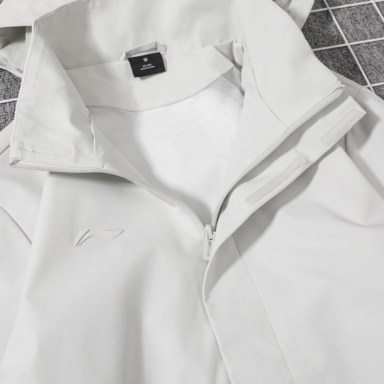 李宁团购系列防泼水运动风衣男2025秋季新款宽松舒适梭织连帽外套