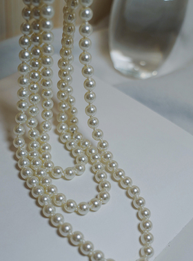 耳边铛超长打结奶油白三层项链