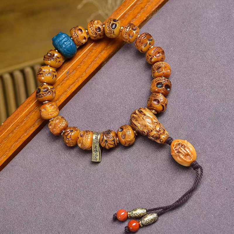 藏传回流牦牛骨雕刻阿呆手串单圈藏式文玩佛珠松狮桶珠雪巴配饰,淘宝优惠券,粉丝福利购,淘宝优惠卷