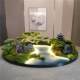 Decorative bonsai flowers in the middle of the dining table