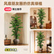 Simulated green plants welcome guests to the antique-style high-end living room in the pine