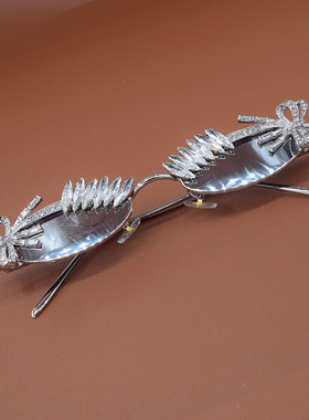 银色镶钻天使翅膀椭圆框太阳镜女偏光蝴蝶结小框高级感圆脸墨镜