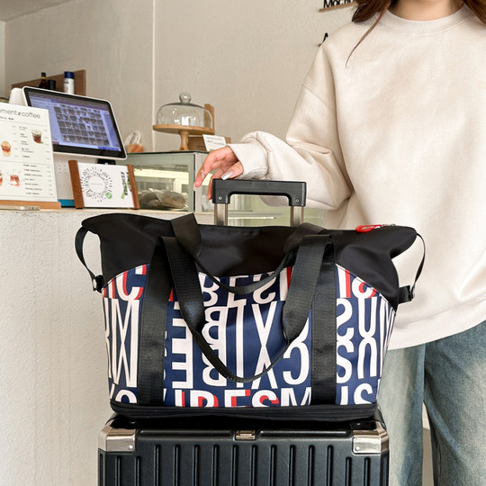 旅行包新款大容量手提行李包旅行轻便包运动健身包出差收纳登机包