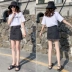 Váy denim nữ 2019 hè mới eo cao thô đen xám đã mỏng in siêu lửa một chiếc túi đeo hông - Váy