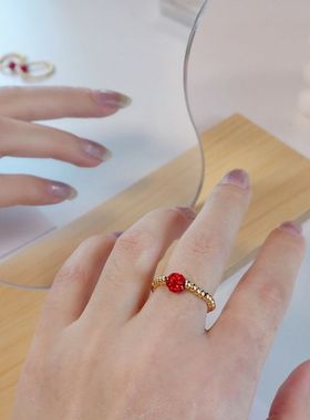 钛钢弹力戒指金豆子红色钻球