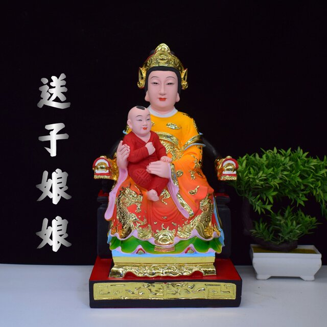 The resin statue of Nuwa Empress Wuxia and Dragon Mother presenting her son to the Empress