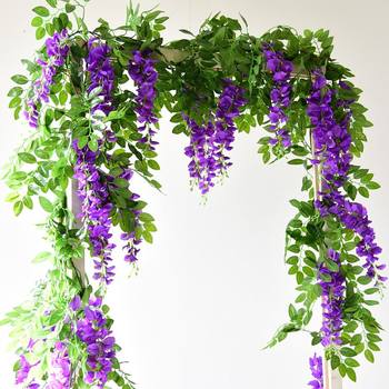 Simulated wisteria rattan indoor ເພດານທໍ່ wedding ການຕົບແຕ່ງດອກກຸຫລາບເຄືອຫໍ່ປະມານດອກໄມ້ພາດສະຕິກ vines ດອກໄມ້ທຽມ