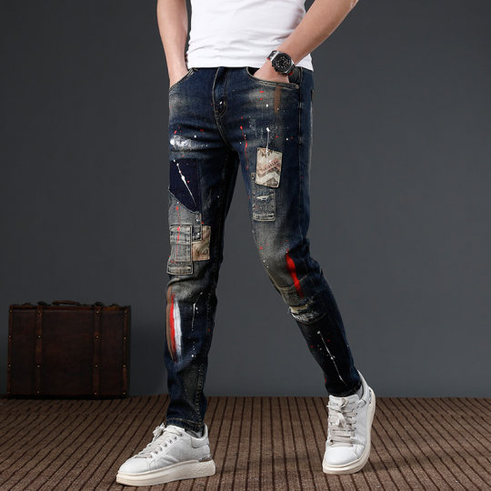 2025 new fashion niche design sense jeans men's ripped ink paint trendy brand slim feet pants men
