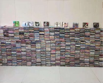 100 CDs packed with random hair and other Japanese pop songs classical jazz countryside light music etc.