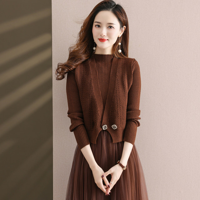 Paired with a skirt and a knitted vest jacket