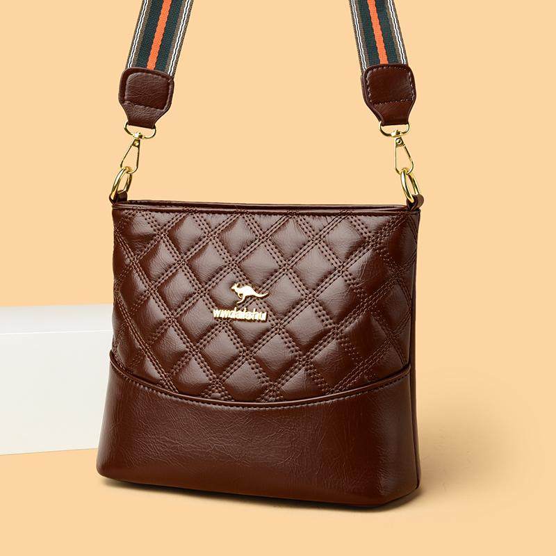 牛皮2025大容量真皮新款中年时尚妈妈水桶女士斜挎包百搭单肩软皮,淘宝优惠券,粉丝福利购,淘宝优惠卷