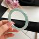 Jade thin round bar bracelet light green floating flower oil cyan