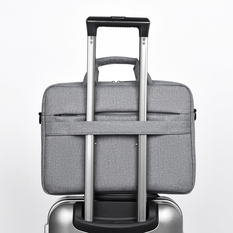 新款男士手提包休闲电脑包文件包 欧曼图箱包男士包袋