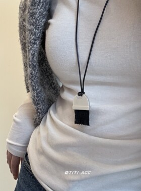 ins冷淡风虎眼石长款串珠项链小众设计感百搭黑色毛刷抽拉毛衣链