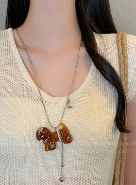 ins风可爱卡通蝴蝶结棕色小狗项链女小众设计长款毛衣链个性配饰